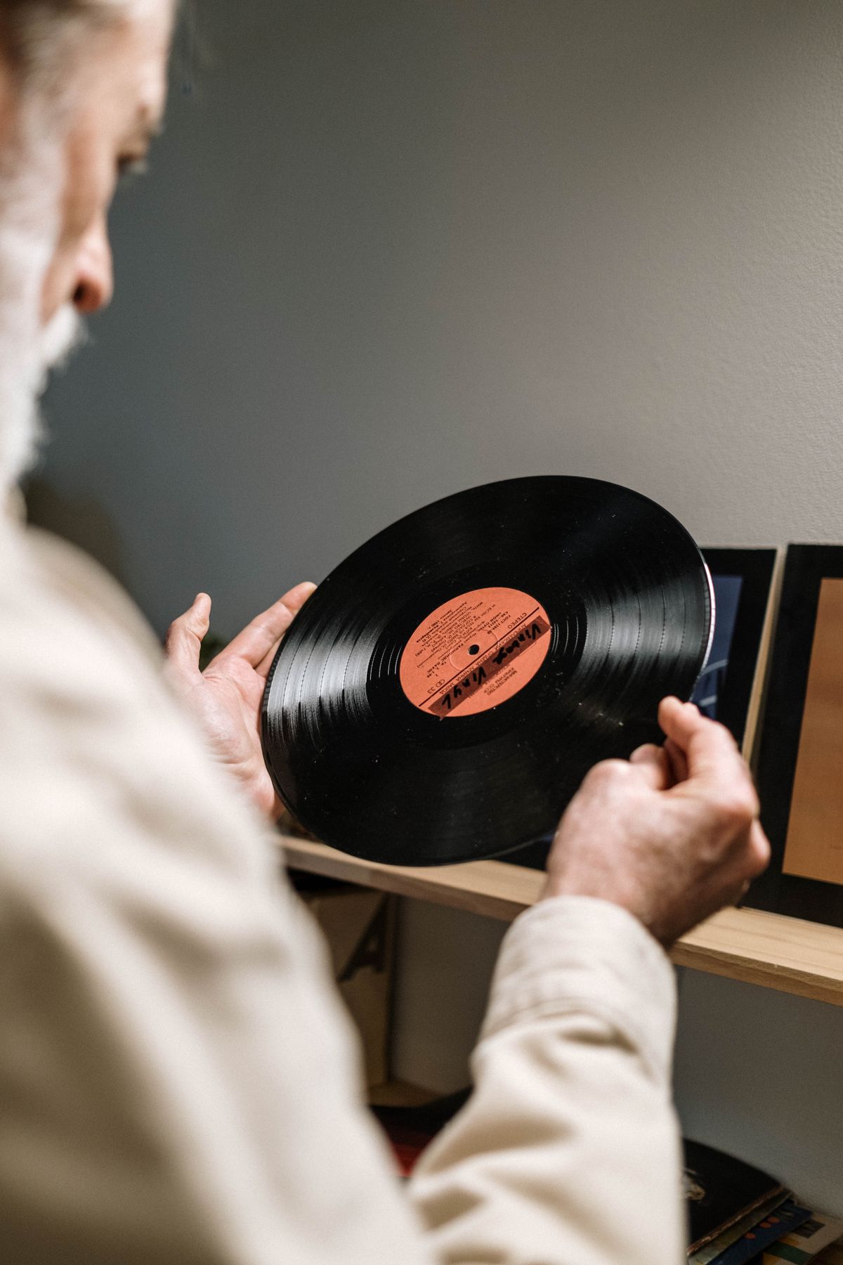 A collector examining a vinyl record