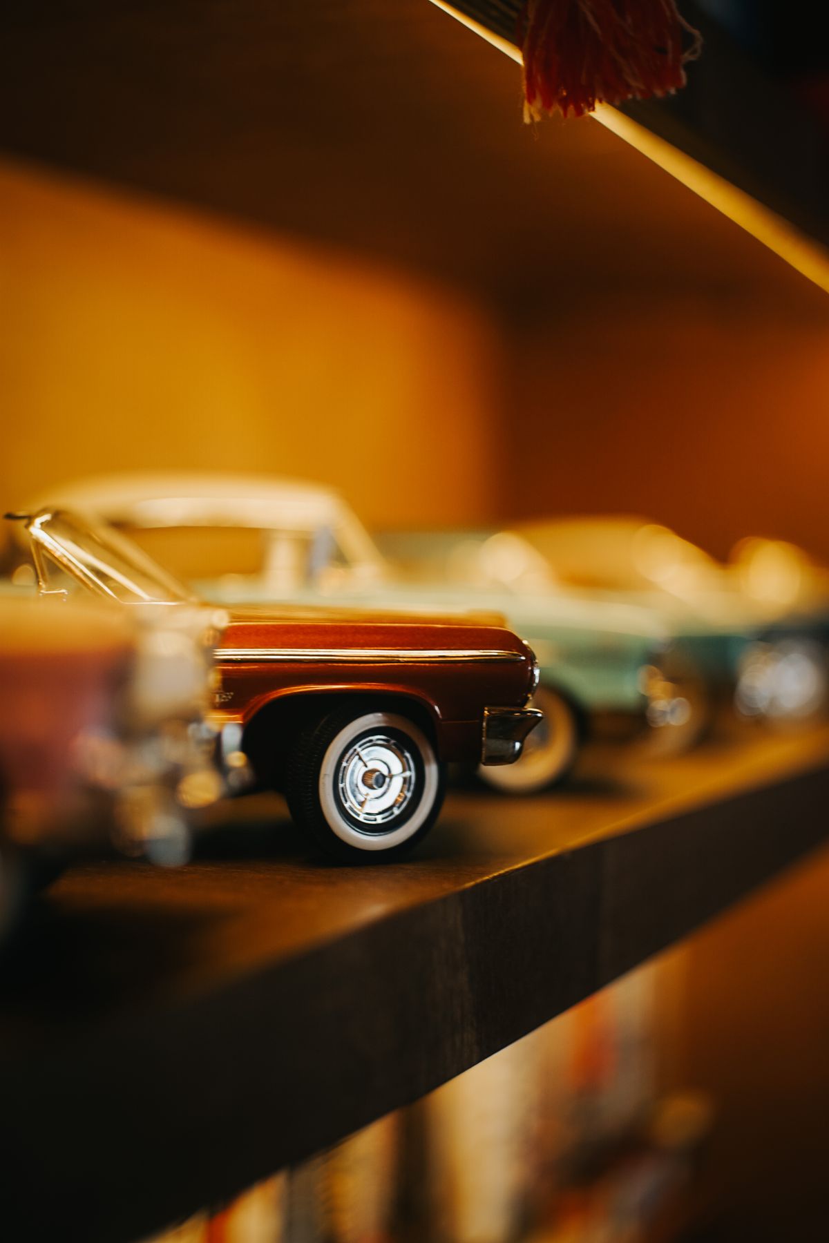 Model cars on a shelf