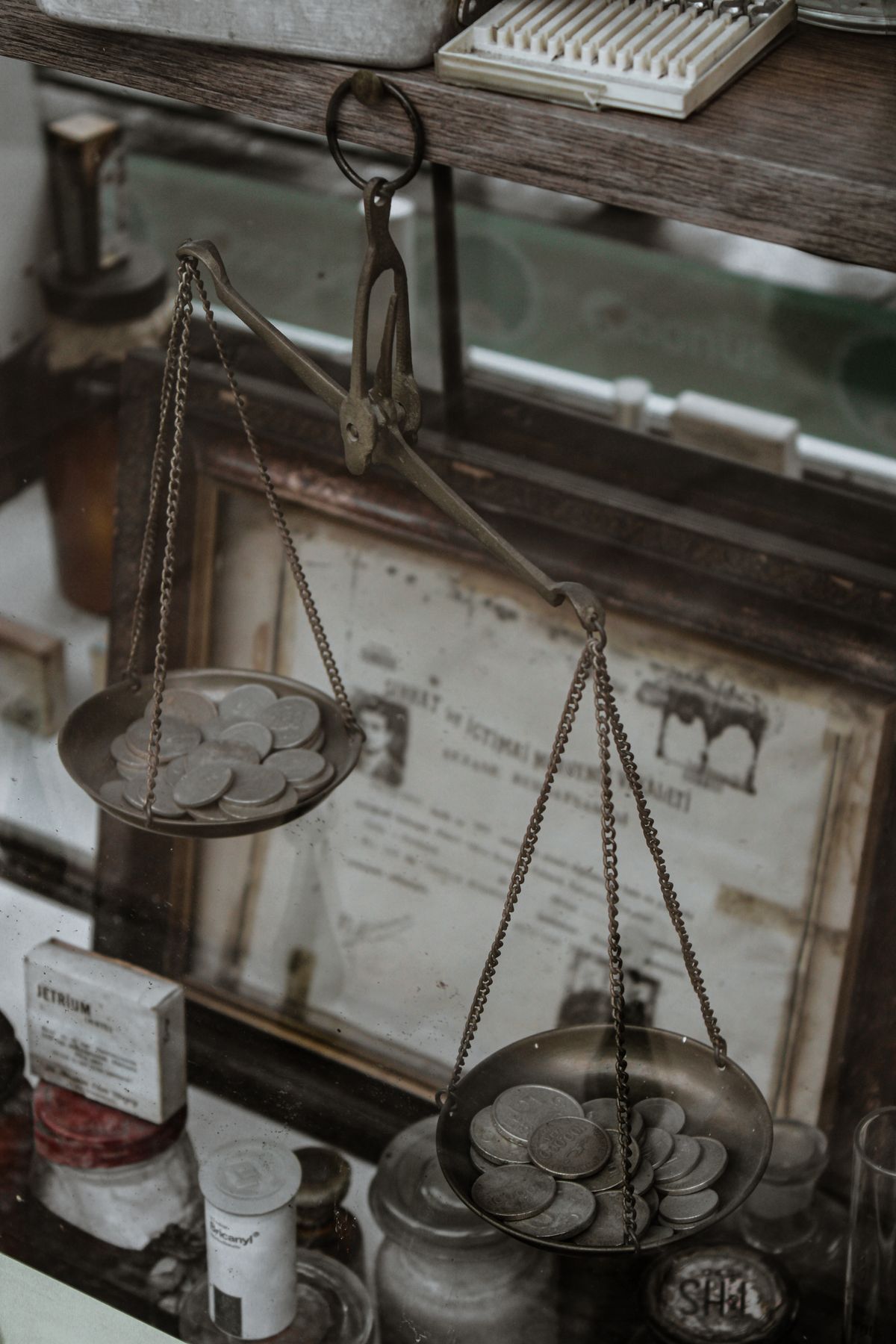 A balance scale with coins
