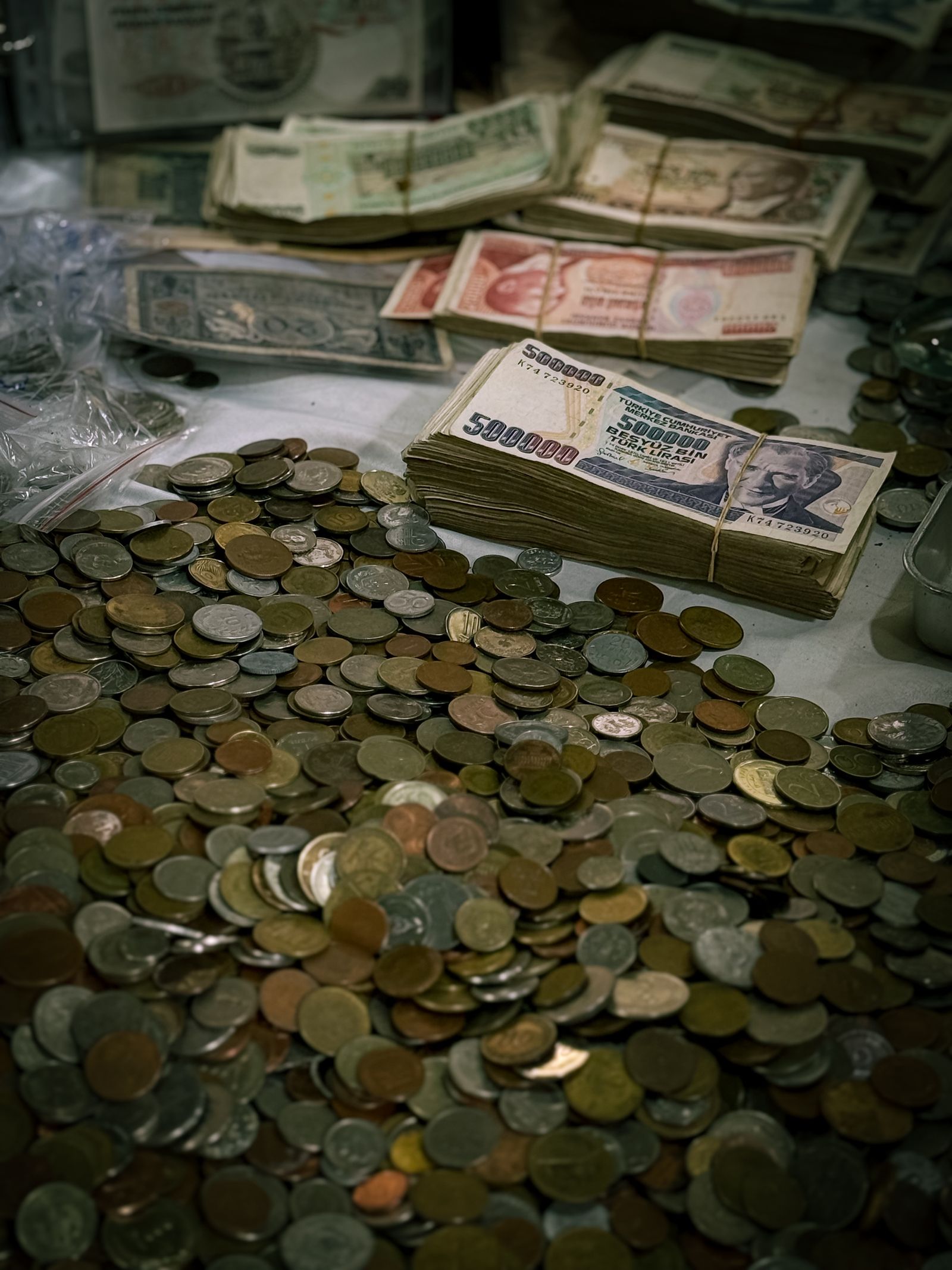 Bundles of banknotes and loose coins
