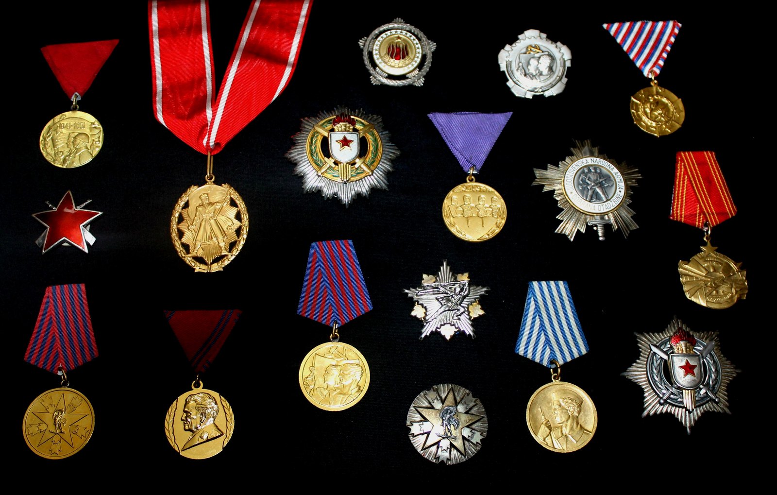 A collection of SFRY decorations on a dark background