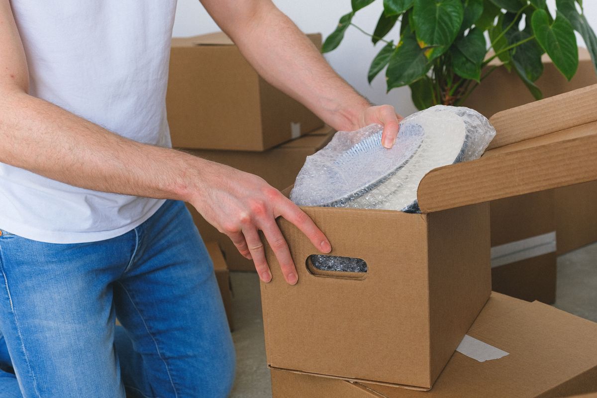 Packing an item into a cardboard box