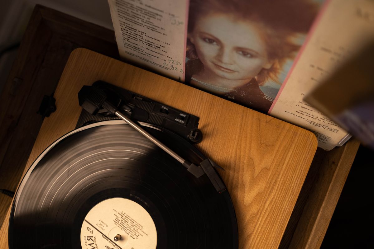 Turntable with an LP and record sleeves, top view