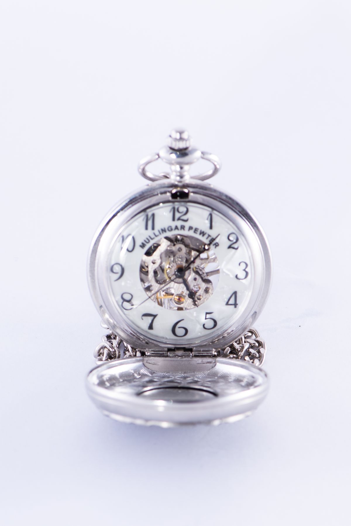 Pocket watch with a white dial